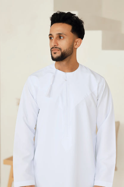 White Omani thobe tassel and embroidery detail – Qalbi
