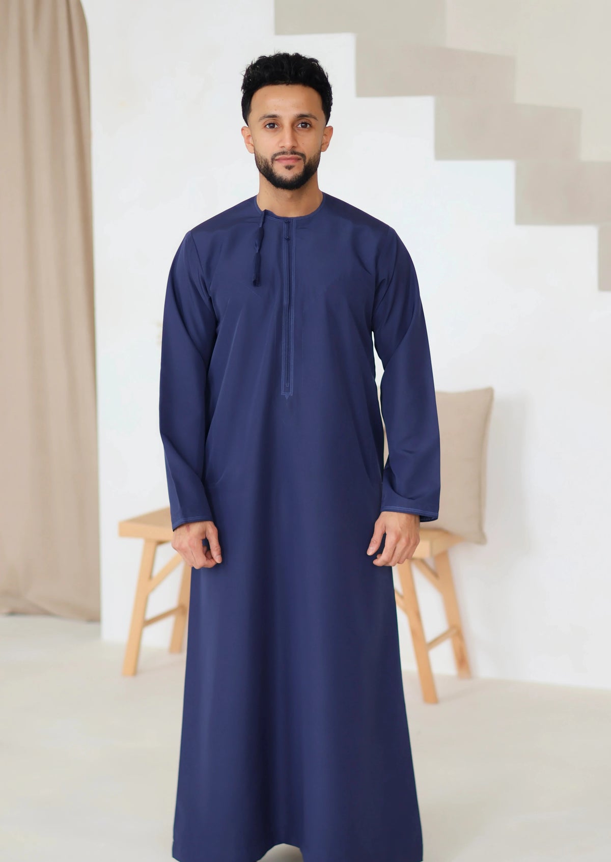 Men’s navy blue Omani thobe front view – Qalbi