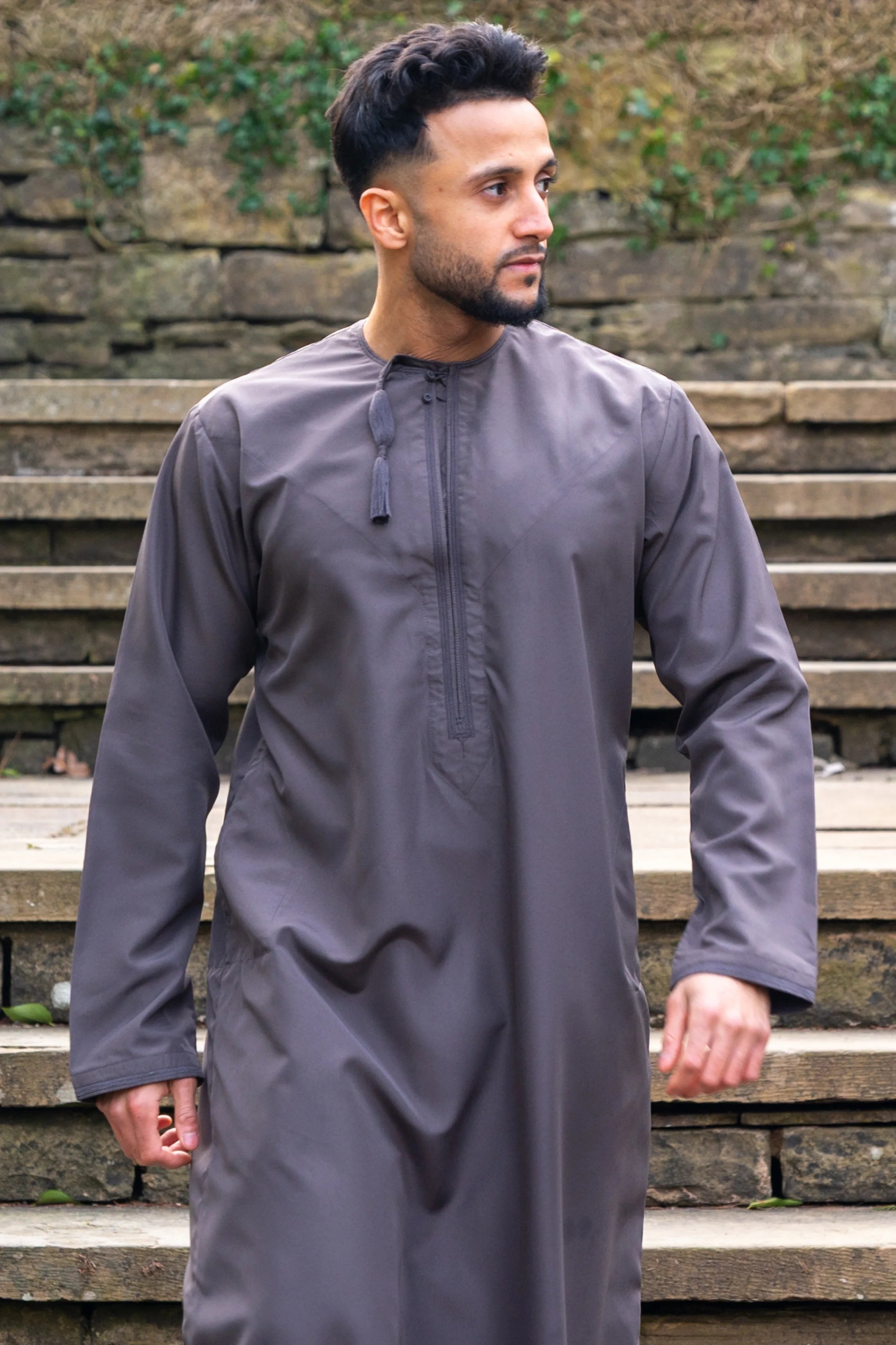 Full view of Omani Grey Premium Thobe / Jubba in natural outdoor light